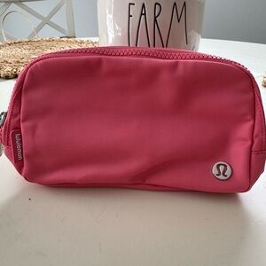 Pink Lululemon belt bag